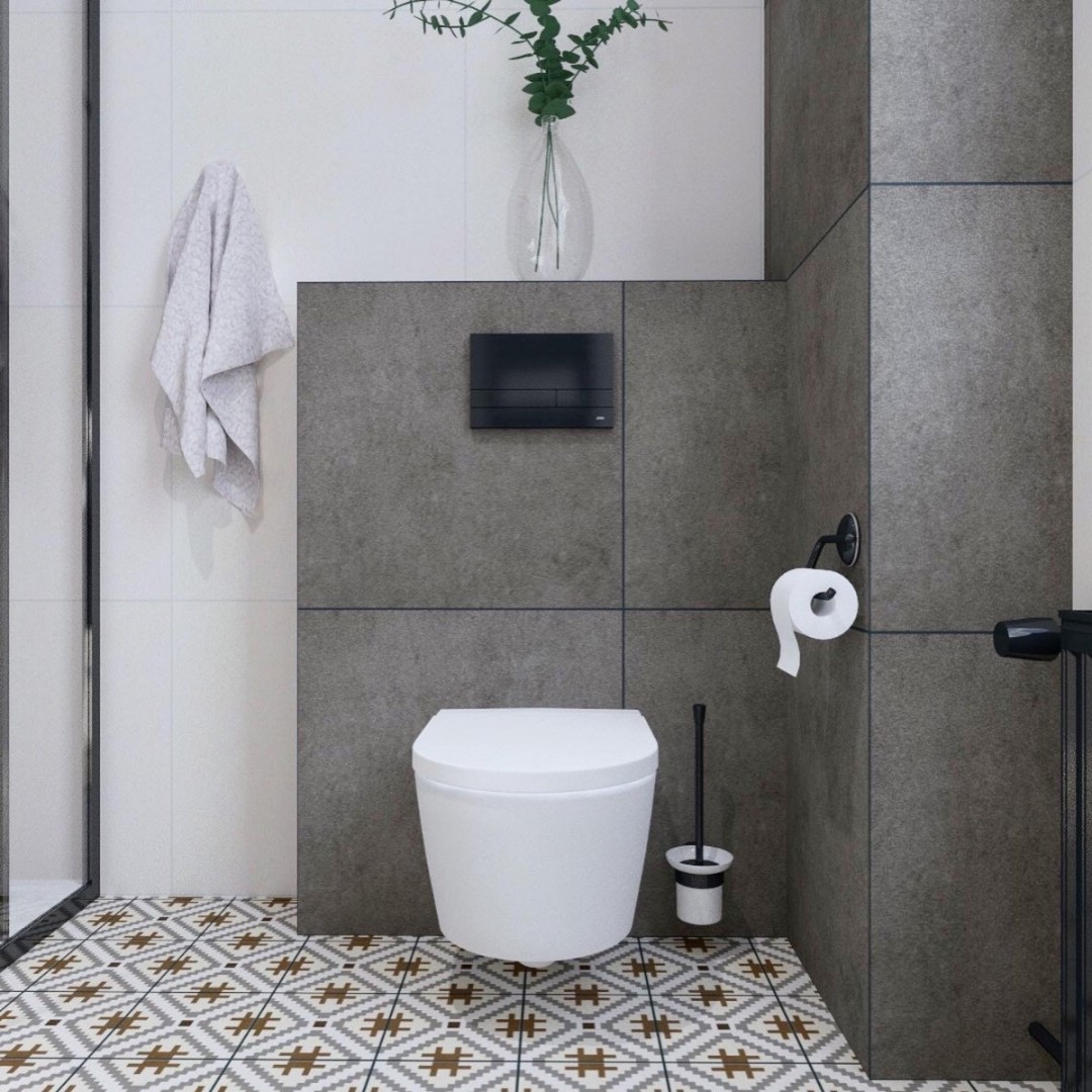 Łazienka w bloku z wzorzystymi płytkami na posadzce!