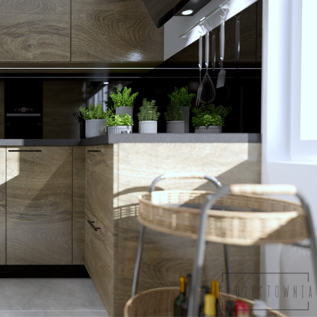 Projekt kuchni z drewnianymi frontami i czarnym blatem!