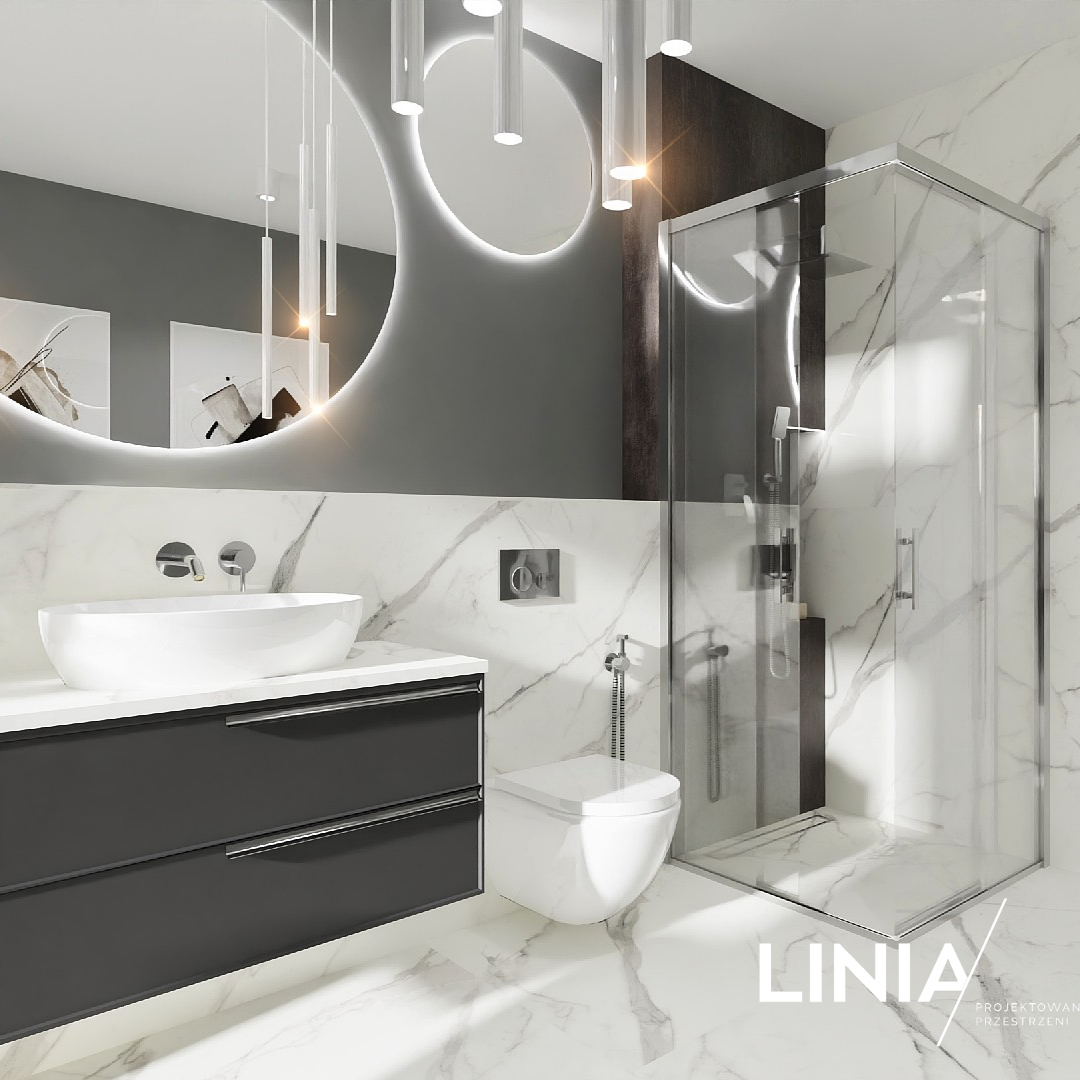 Biały marmur w towarzystwie wanny wolnostojącej oraz kabiny prysznicowej! 