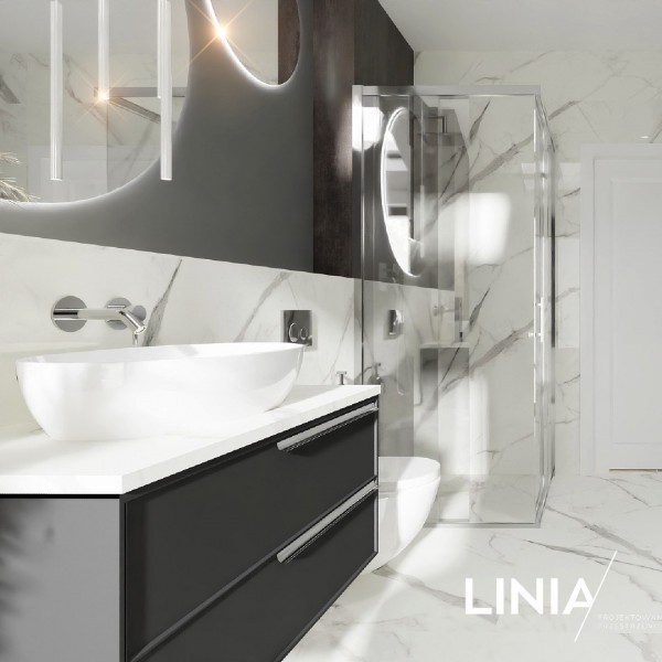 Biały marmur w towarzystwie wanny wolnostojącej oraz kabiny prysznicowej! 