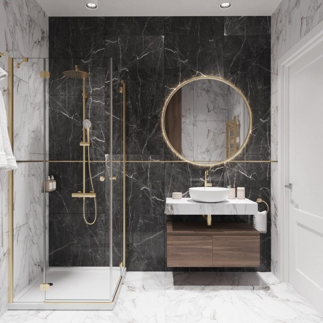 Złote baterie łazienkowe w marmurowej łazience!