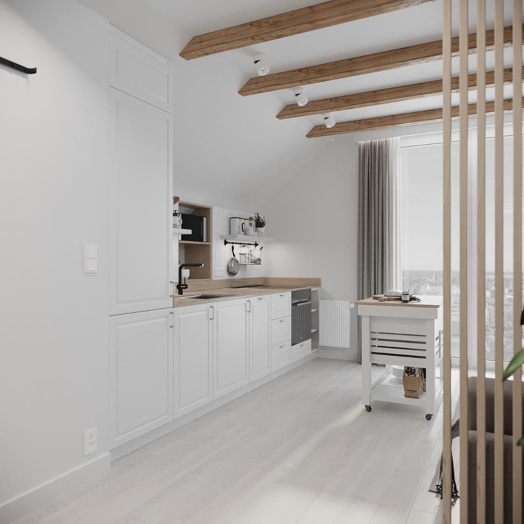 Biała kuchnia na poddaszu z czarna baterią kuchenną!