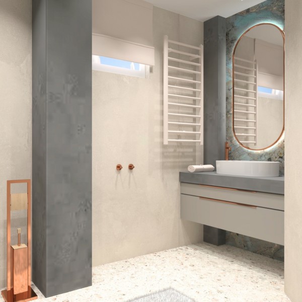 Łazienka z owalną umywalką nablatową i marmurową ścianą – inspiracje do aranżacji