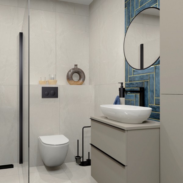 Nowoczesna łazienka z granatowymi płytkami i czarnymi bateriami łazienkowymi