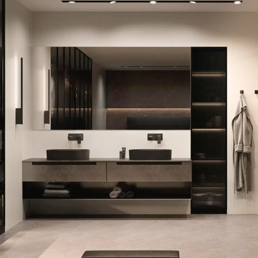 Czarna umywalka nablatowa owalna w eleganckiej łazience z grafitowymi akcentami