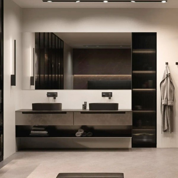 Czarna umywalka nablatowa owalna w eleganckiej łazience z grafitowymi akcentami