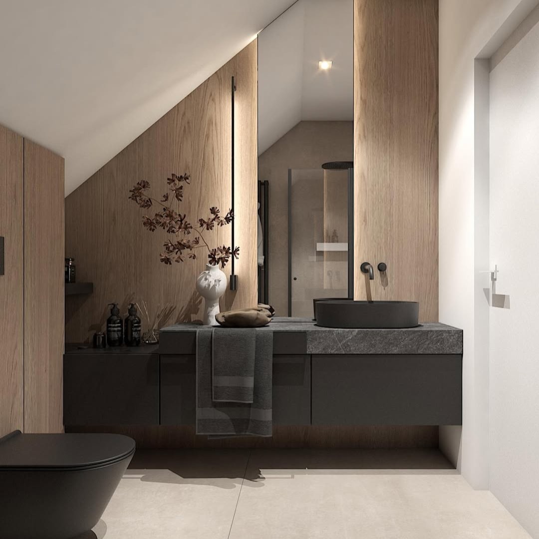 Łazienka na poddaszu z zestawem podtynkowym Geberit i czarną ceramiką