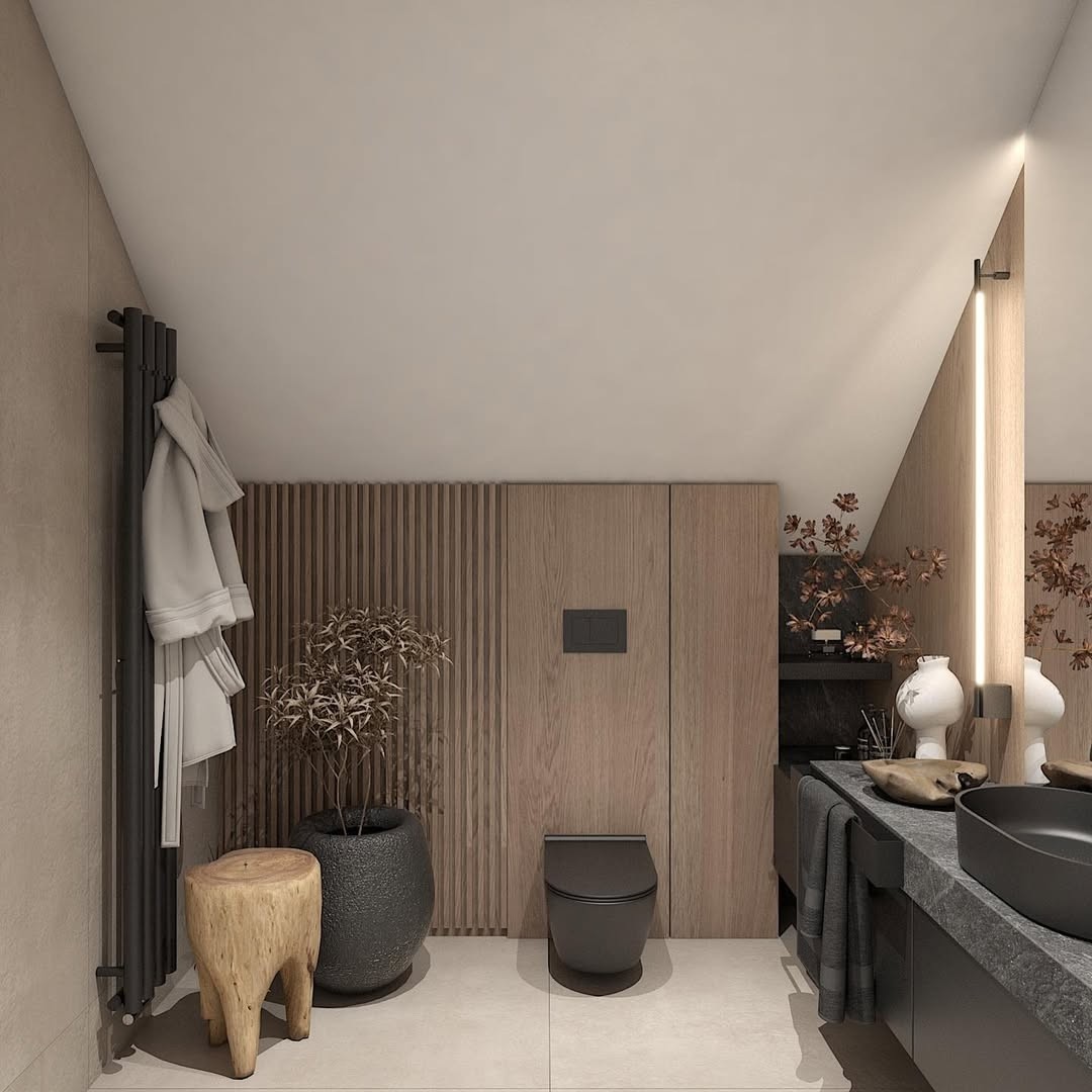 Łazienka na poddaszu z zestawem podtynkowym Geberit i czarną ceramiką