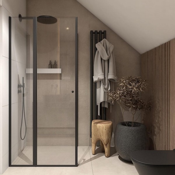 Łazienka na poddaszu z zestawem podtynkowym Geberit i czarną ceramiką